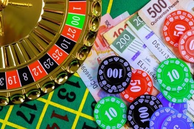 Mobile phone displaying esports betting interface on maxim platform with game information
